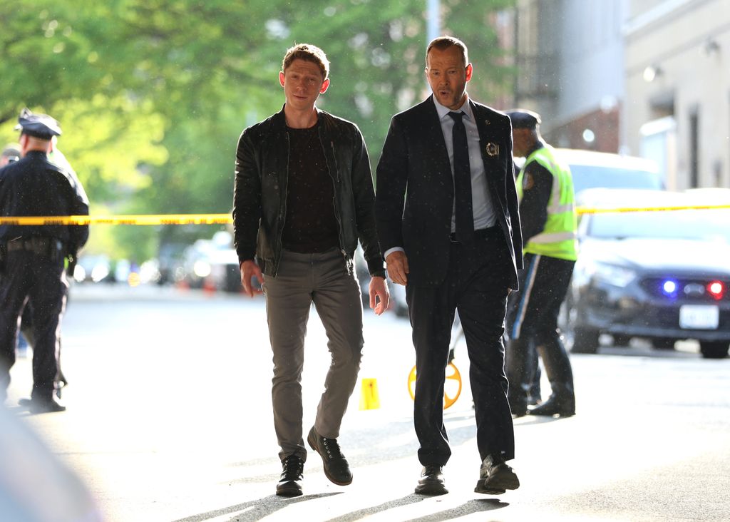 Will Hochman and Donnie Wahlberg are seen on the set of "Blue Bloods" on May 08, 2024 in New York City.  (Photo by Jose Perez/Bauer-Griffin/GC Images)