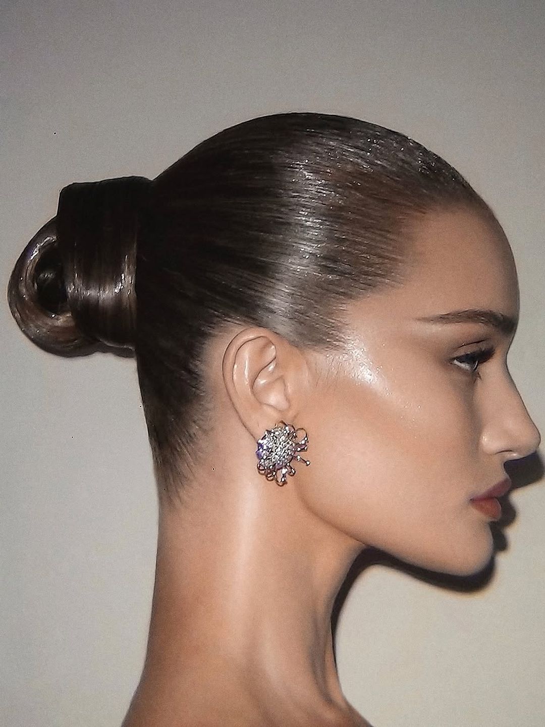 A closer look at the sculpted ballerina bun and frosty glam