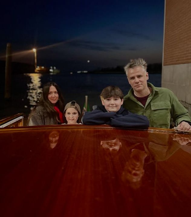 Richard Bacon with his wife and children on a boat