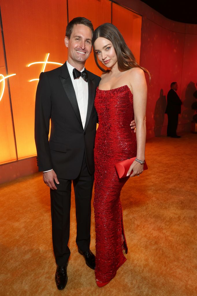 Evan Spiegel and Miranda Kerr attend the 2025 Vanity Fair Oscar Party Hosted By Radhika Jones at Wallis Annenberg Center for the Performing Arts on March 02, 2025 in Beverly Hills, California