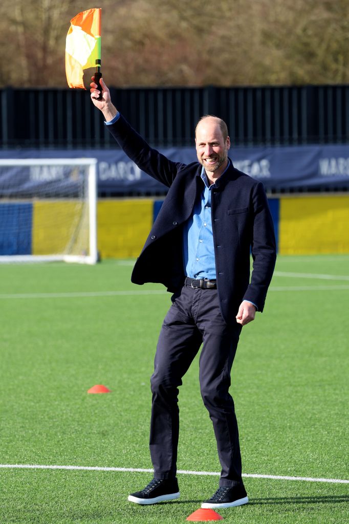 William waves the linesman's flag