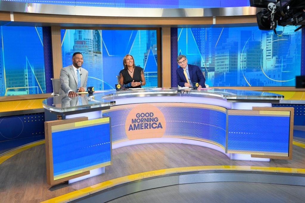 George Stephanopoulos with his GMA co-stars Robin Roberts and Michael Strahan 