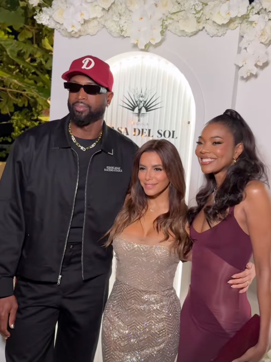 Eva poses with Gabrielle Union and Dwayne Wade