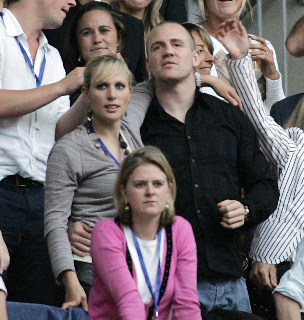 Zara Tindall with her arm around Mike Tindall