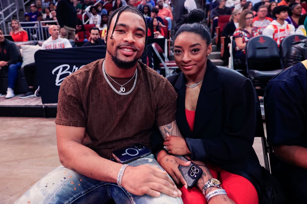 Simone Biles and Jonathan Owens attend basketball game