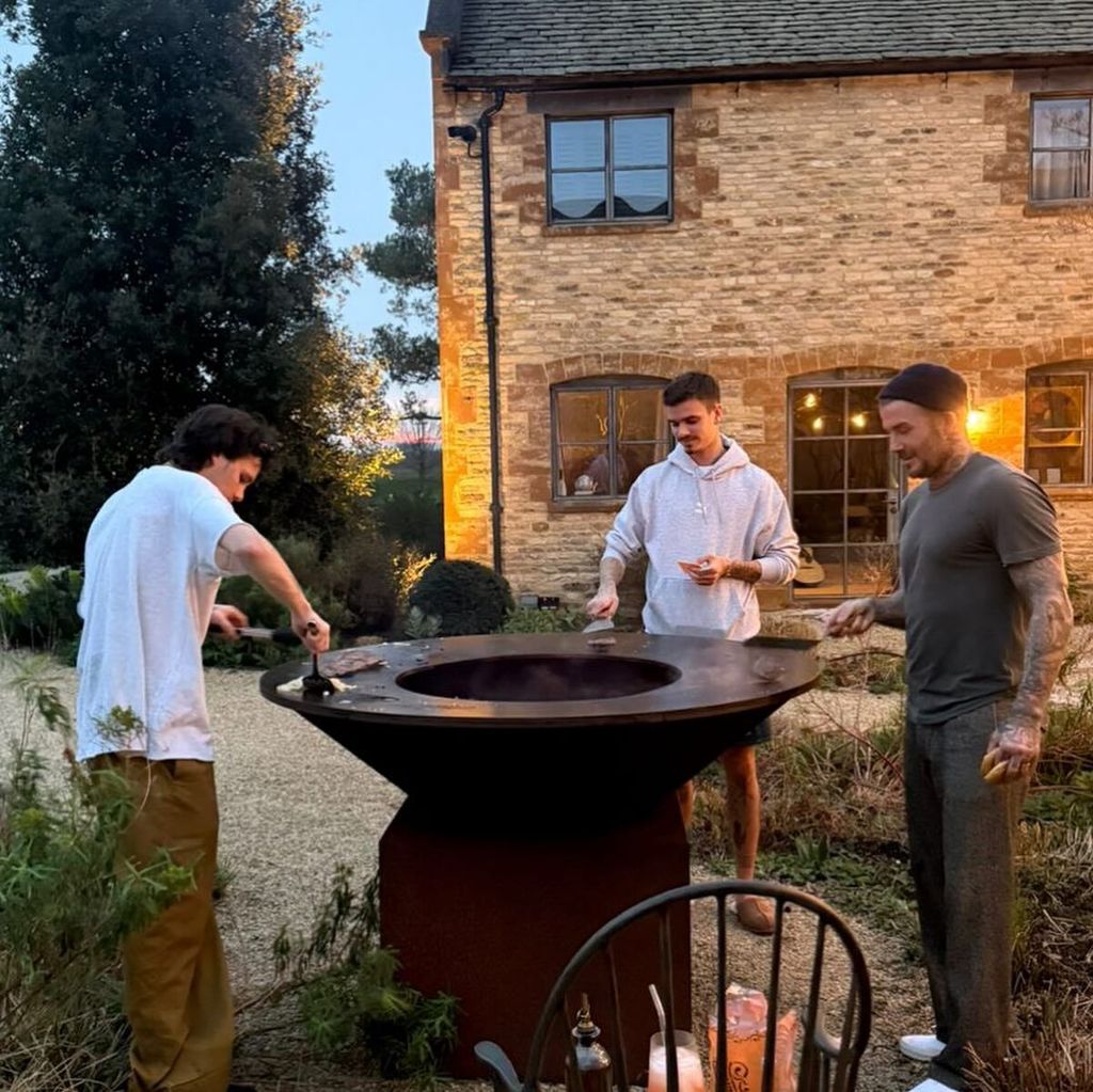 david beckham with two of his sons around BBQ 
