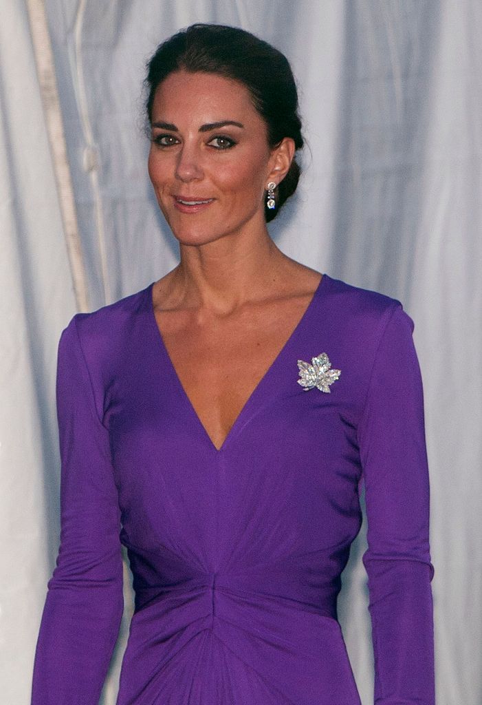 Kate Middleton wearing a purple Issa dress during the Royal Couple's North American Tour on July 1, 2011 in Ottawa, Canada.  