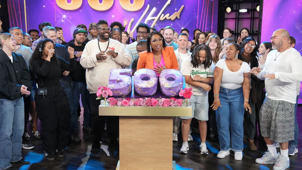 jennifer hudson standing behind 500 cake on talk show