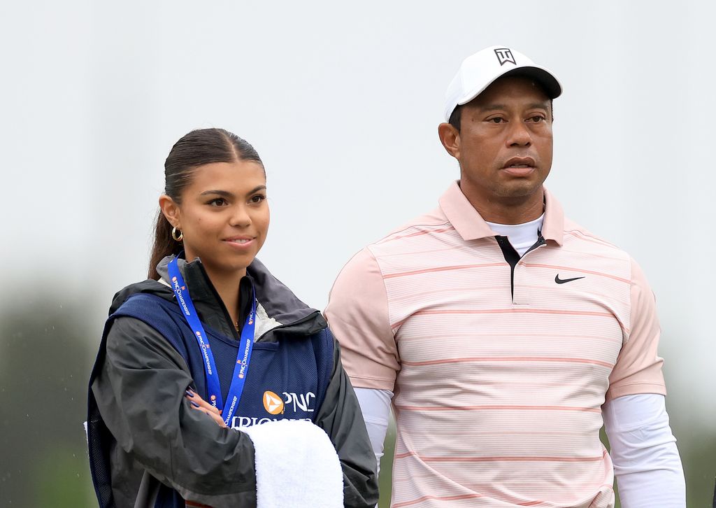 Tiger Woods with daughter Sam on the golf course