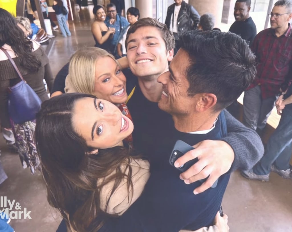 Kelly Ripa, Mark Consuelos and Lola Consuelos embrace Joaquin Consuelos' at his graduation ceremony at the University of Michigan, shared on LIVE with Kelly and Mark