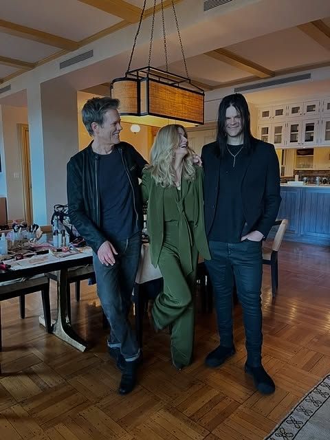 Kevin Bacon, Kyra Sedgwick and Travis Bacon pose for a candid photo at home, shared on Instagram