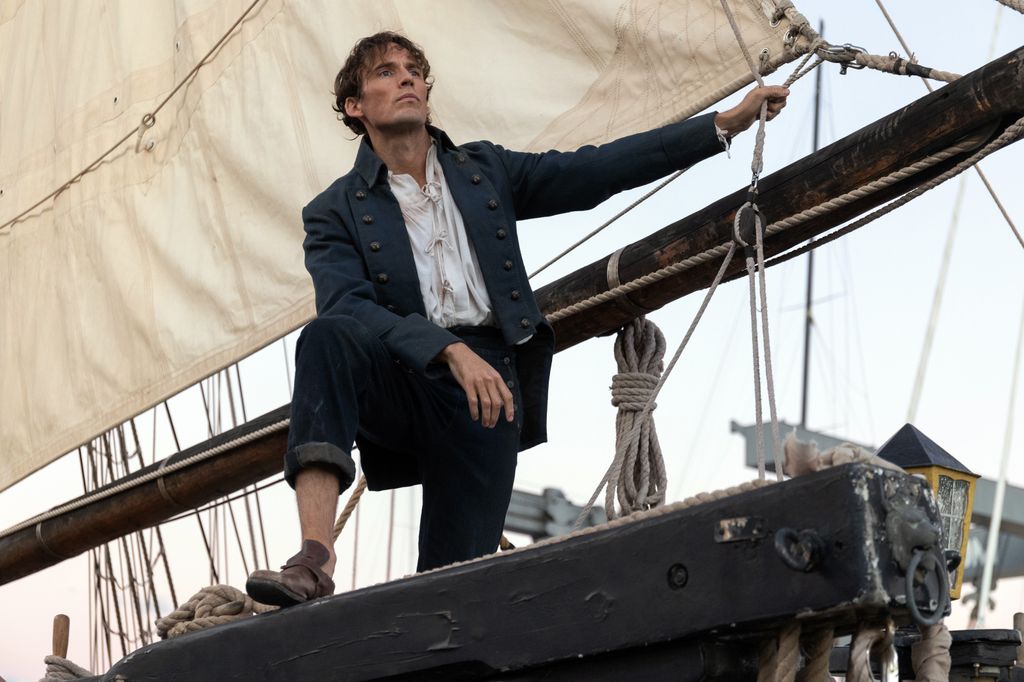 man standing on ship