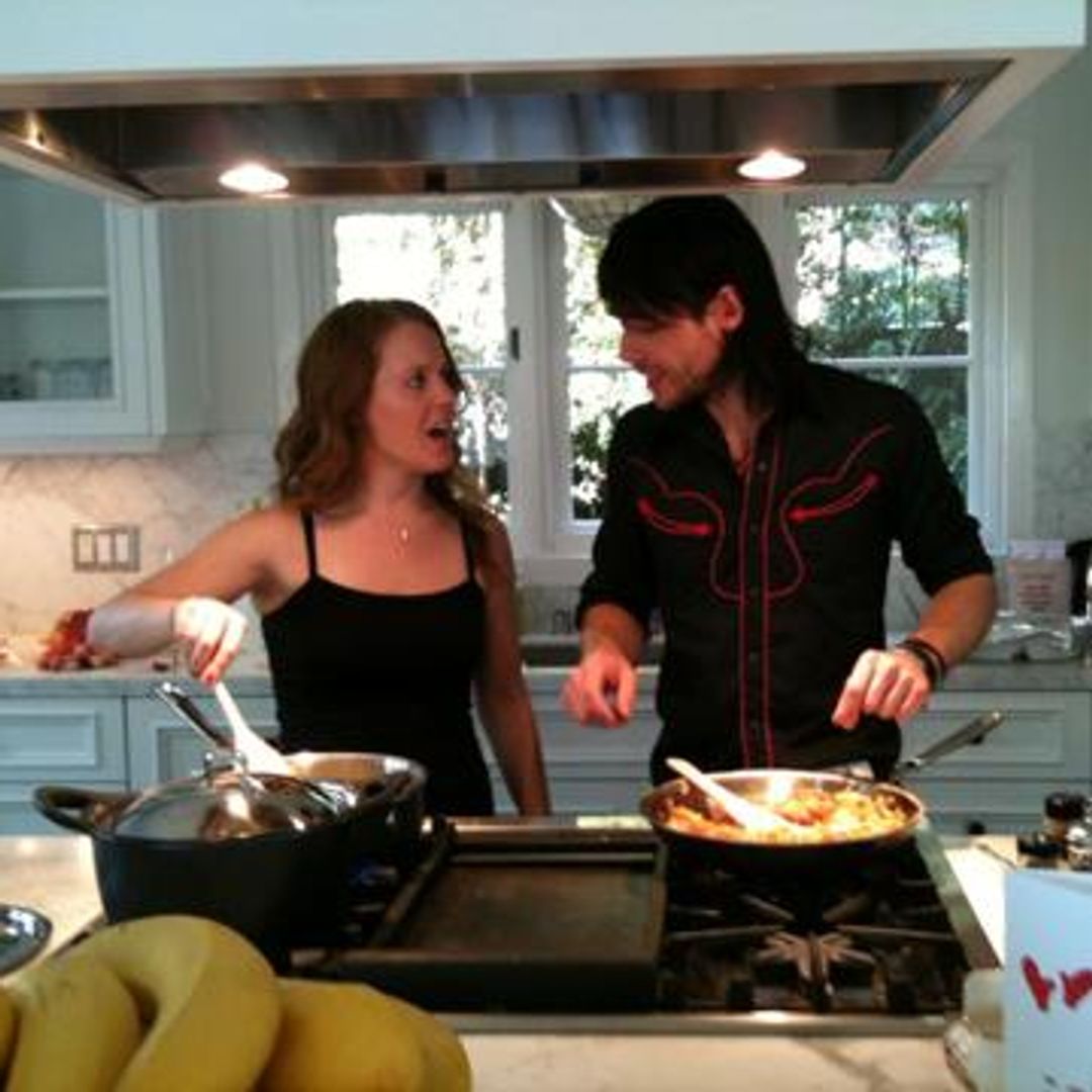 Angela Hudson and her husband Svend Lerche captured cooking together in their home, shared on X