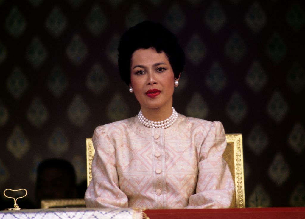 Queen Sirikit seen during the visit to Thailand of Malcolm Forbes at the launch of a 90-foot-tall elephant-shaped balloon in Sanam Luang Park in front of the Grand Palace, Bangkok, Thailand