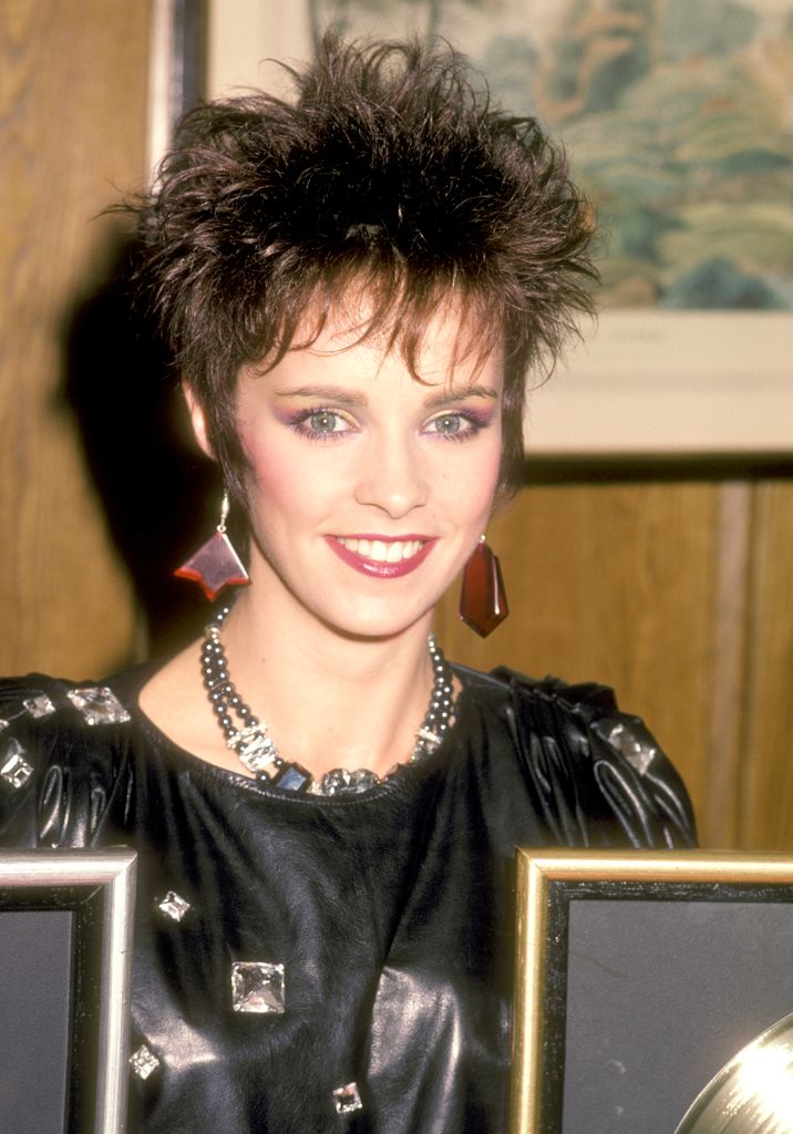 Sheena receives Platinum and Gold Record Awards for her album "Private Heaven" in 1985