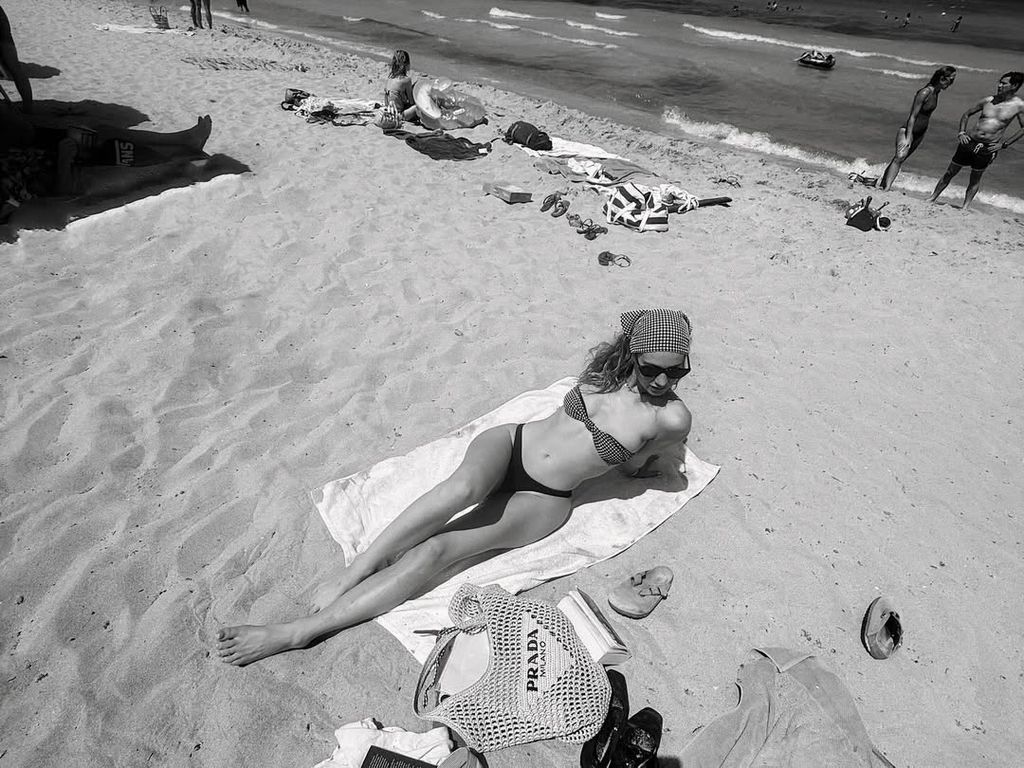 lily james on the beach in bandeau bikini and headscarf