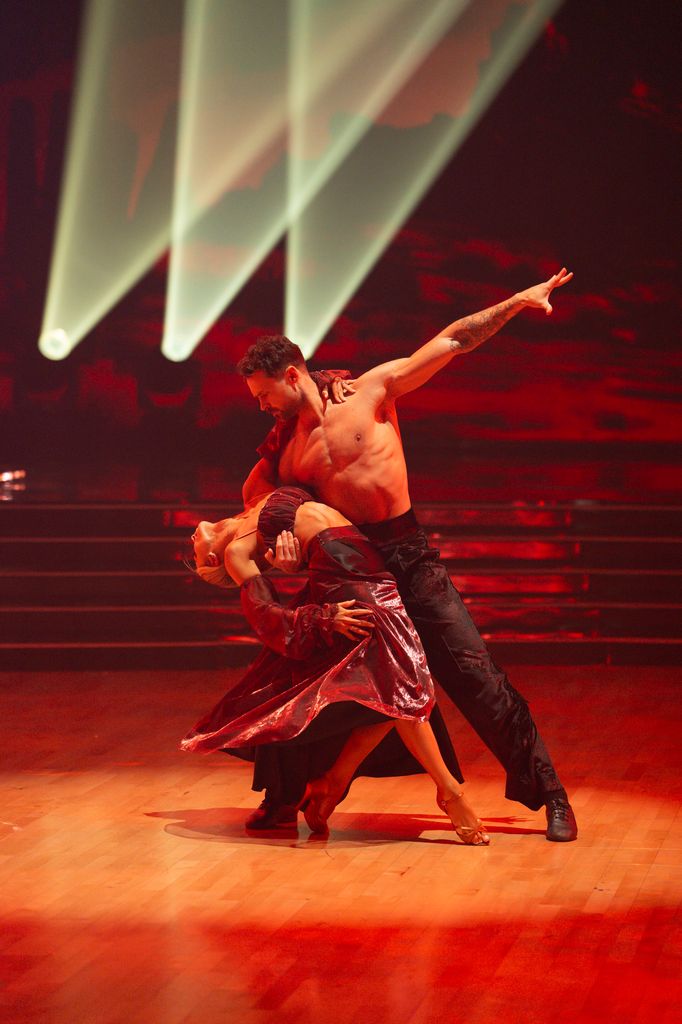 Dylan Efron and Daniella Karagach perform during the Judges' Choice round in the DWTS 2025 finale