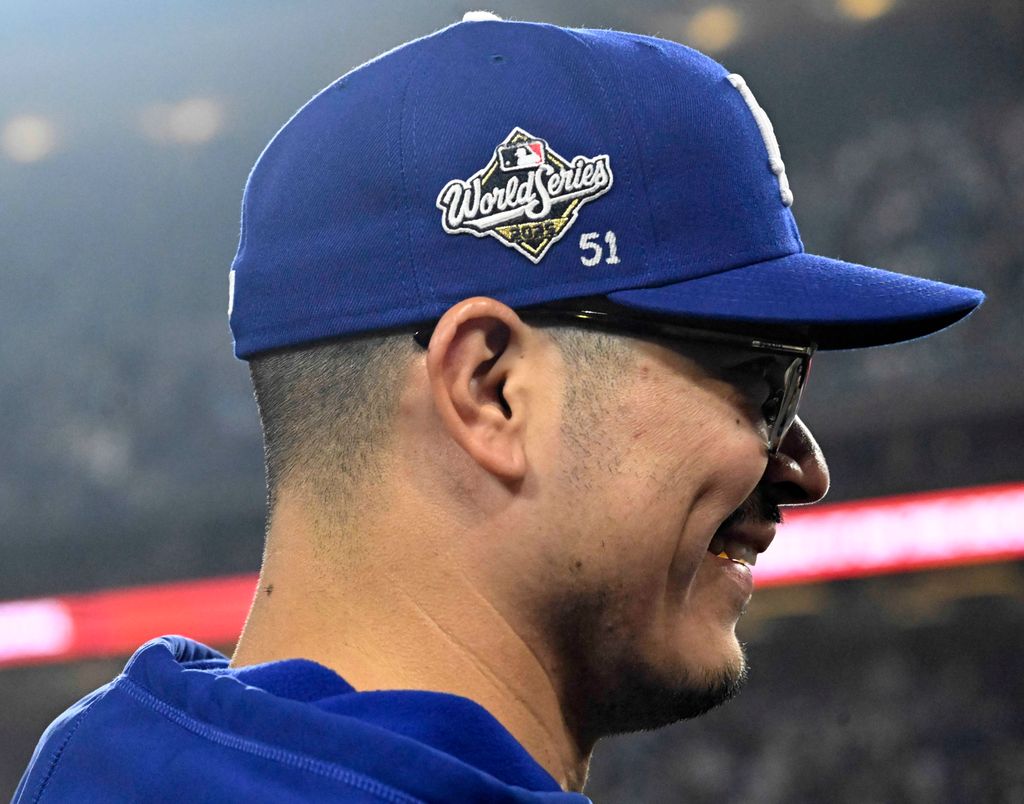 Relief pitcher Anthony Banda with #51 on his hat for Alex Vesia of the Los Angeles Dodgers during game 3 of a World Series baseball game in 2025
