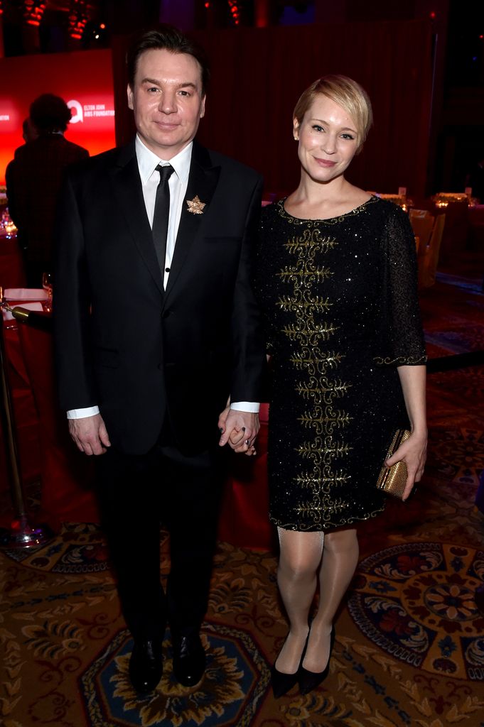  Actor Mike Myers (L) and Kelly Tisdale attend the Elton John AIDS Foundation's 13th Annual An Enduring Vision Benefit in 2014