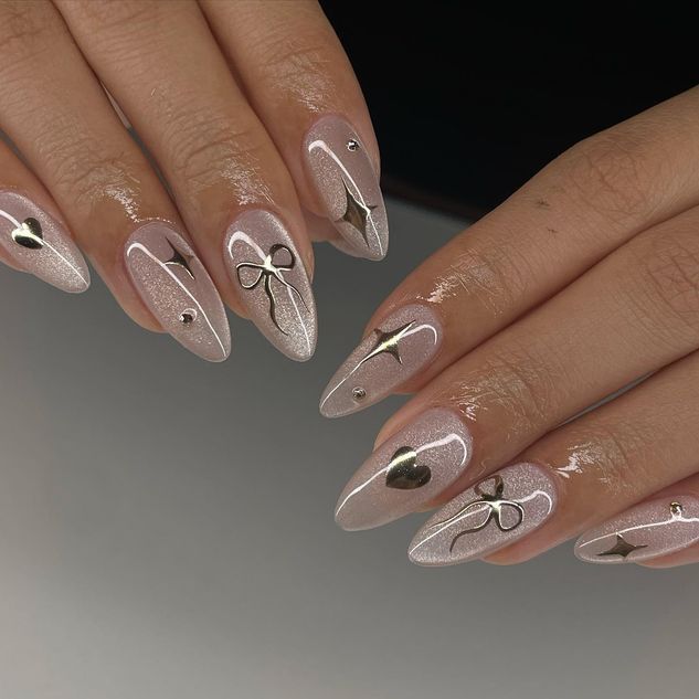 prettymuch_nails coquette cat eye nails 
