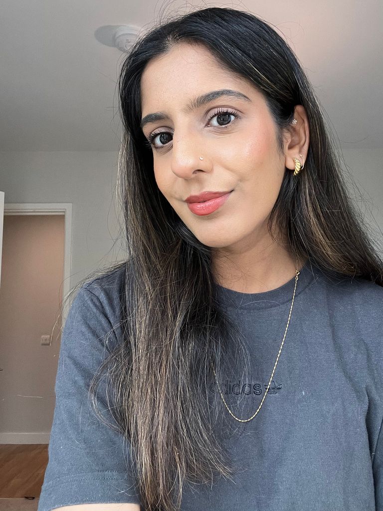 beautiful brunette woman in a grey tshirt