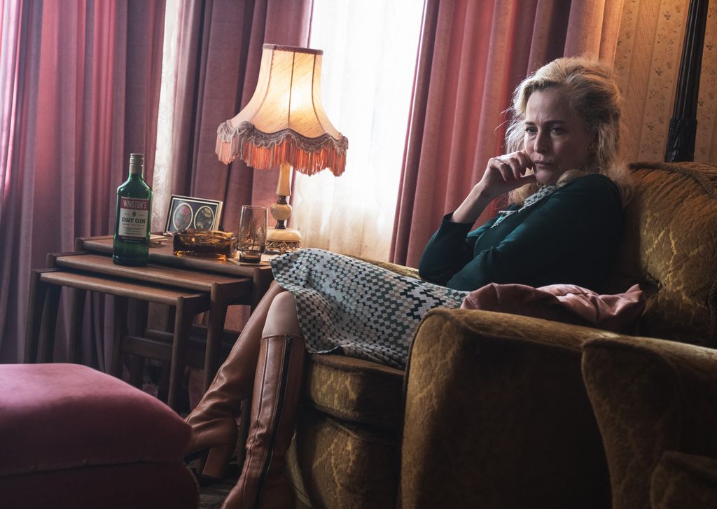 Woman sitting in armchair