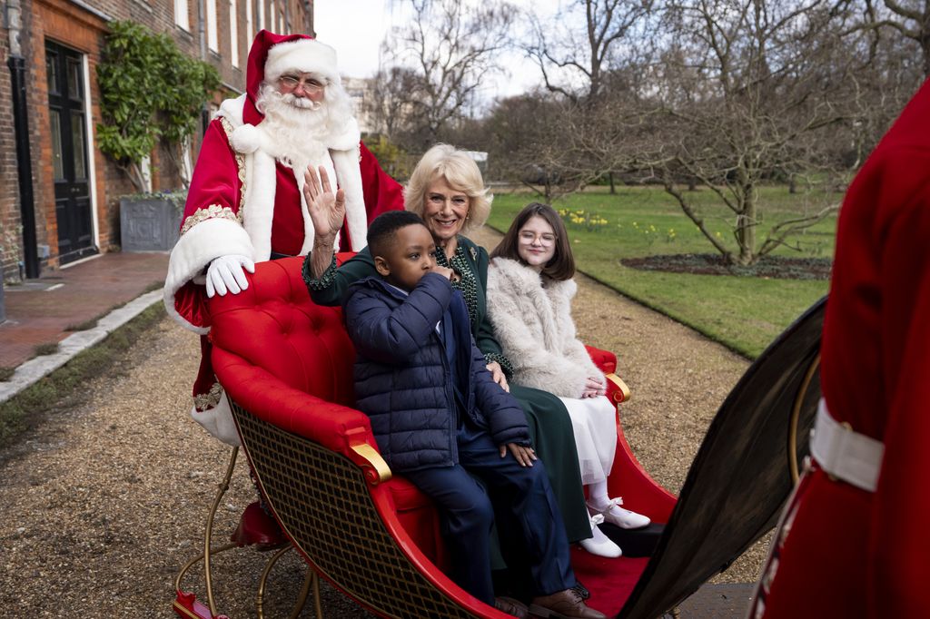 Queen Camilla joined Samuel and Myla on the State Sleigh