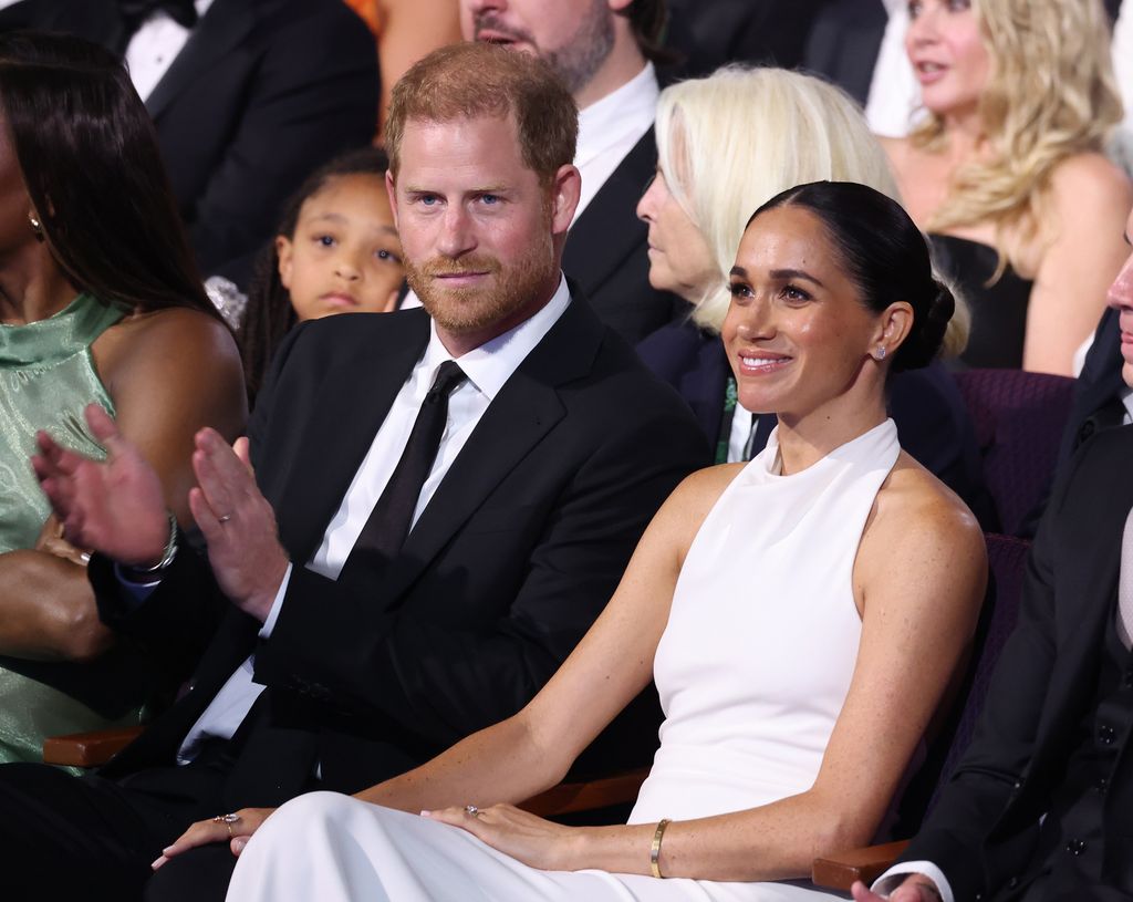 Prince Harry and Meghan Markle sitting down