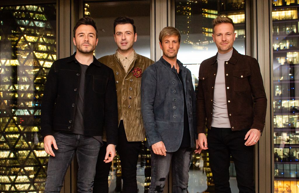 Westlife (L-R) Shane Filan, Mark Feehily, Kian Egan and Nicky Bryne attend an intimate evening with Westlife, hosted by Vernon Kay, at the Pan Pacific London on November 05, 2021