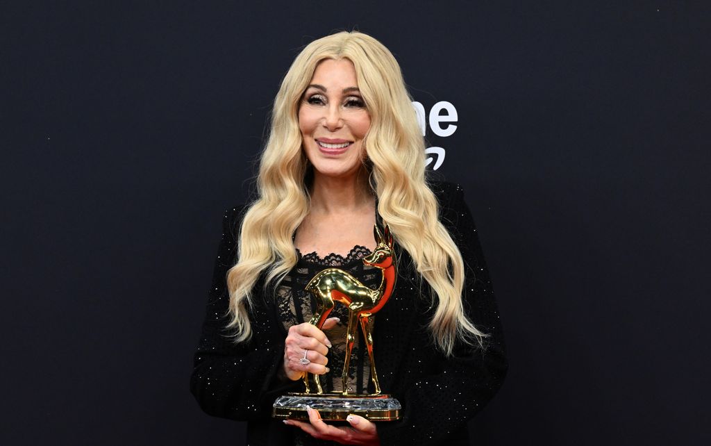 Cher shows off her Bambi on the red carpet at the 77th Bambi Awards