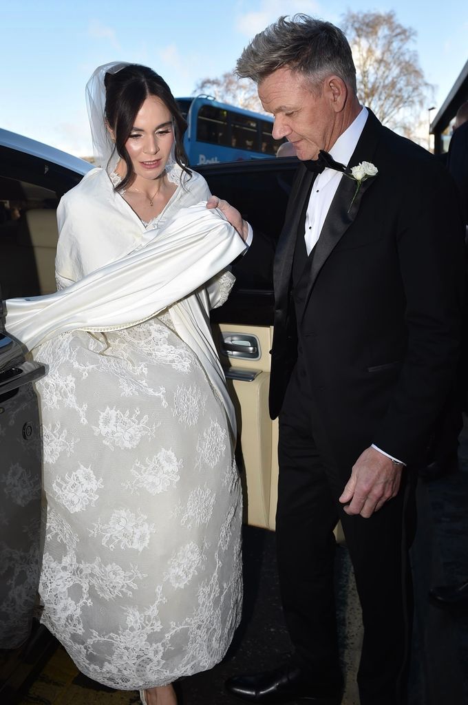 Bride Holly Ramsay and her father Gordon Ramsay are pictured arriving at Bath Abbey for her wedding to Olympian Adam Peaty