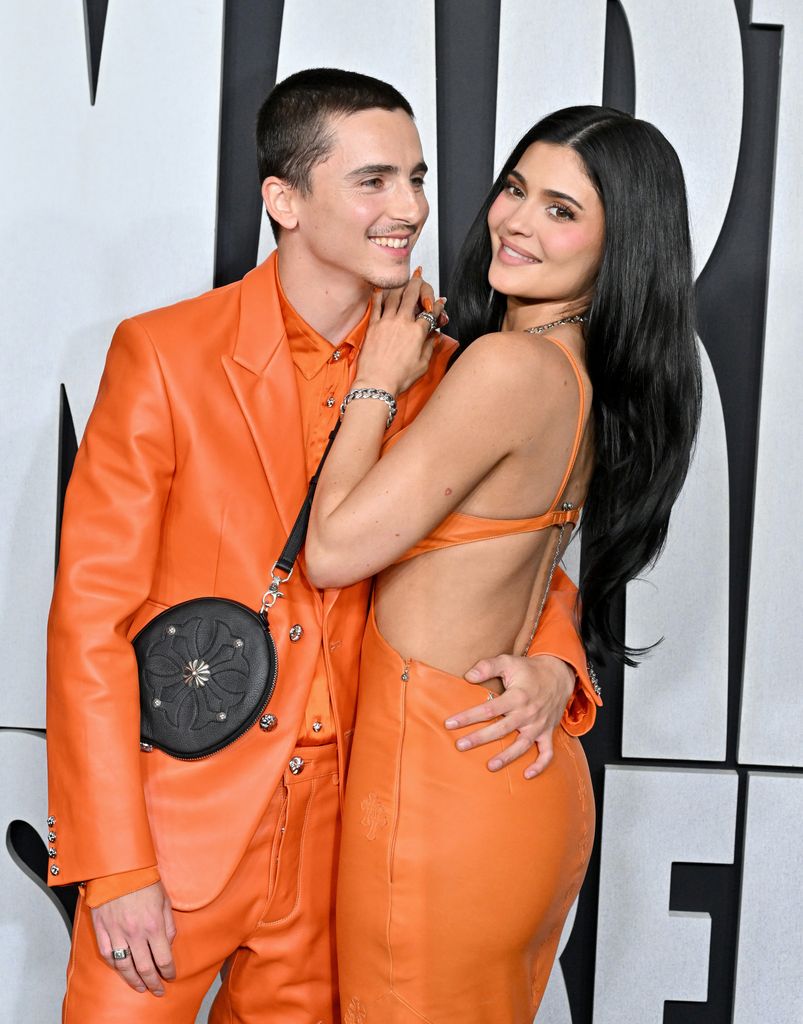 TimothÃ©e Chalamet and Kylie Jenner in matching orange outfits