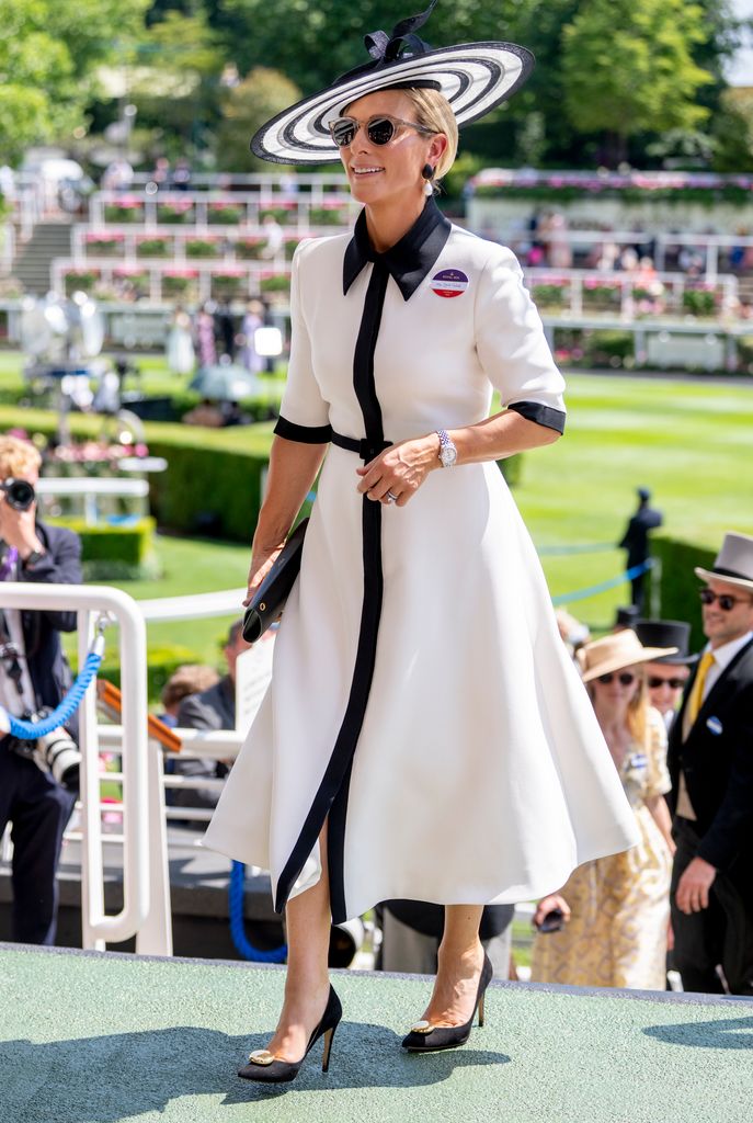 Zara at racecourse in black and white dress and hat