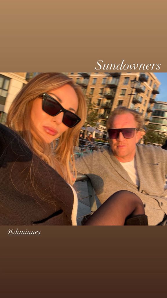 couple posing for selfie in sunshine