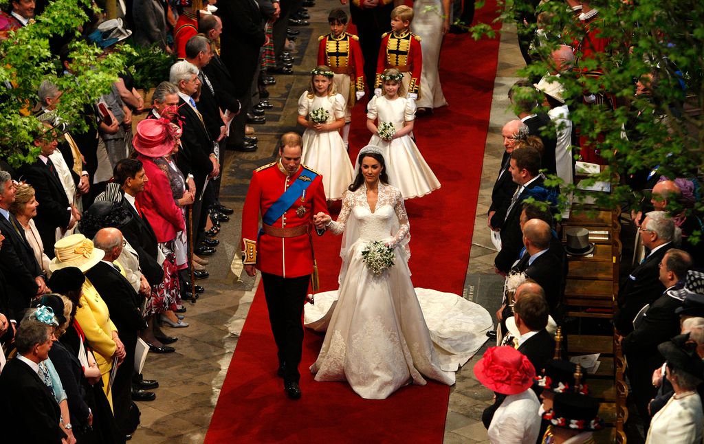 Prince William, Duke of Cambridge and his new bride Catherine, Duchess of Cambridge walk down the aisle