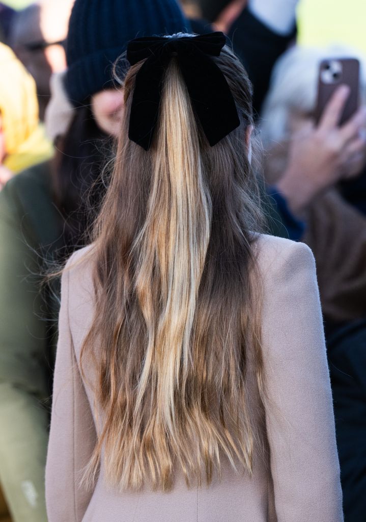 Princess Charlotte's hair from behind with big bow