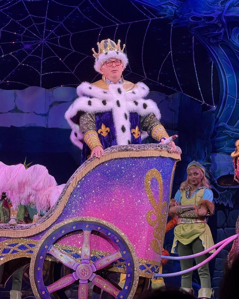 Christopher Biggins dressed as a king in a pantomime