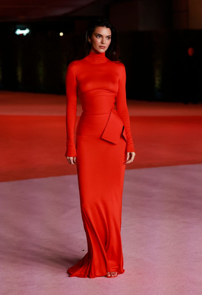 Kendall Jenner in red dress attends the 3rd Annual Academy Museum Gala at the Academy Museum of Motion Pictures in Los Angeles
