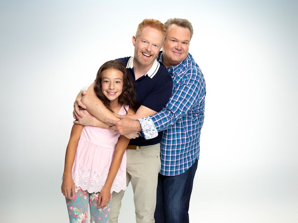 Aubrey Anderson-Emmons as Lily Tucker-Pritchett, Jesse Tyler Ferguson as Mitchell Pritchett, and Eric Stonestreet as Cameron Tucker on modern Family, 2018