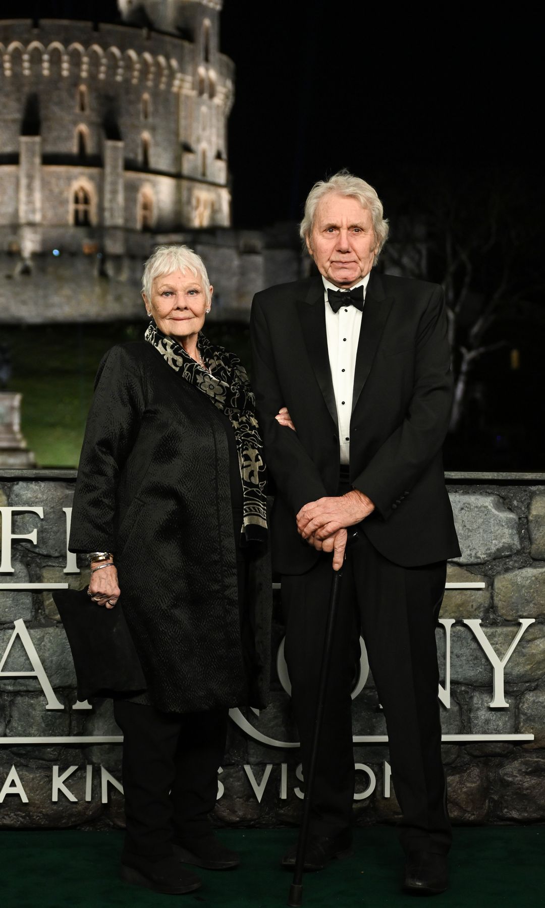 Dame Judi Dench with husband David Mills outside Windsor Castle