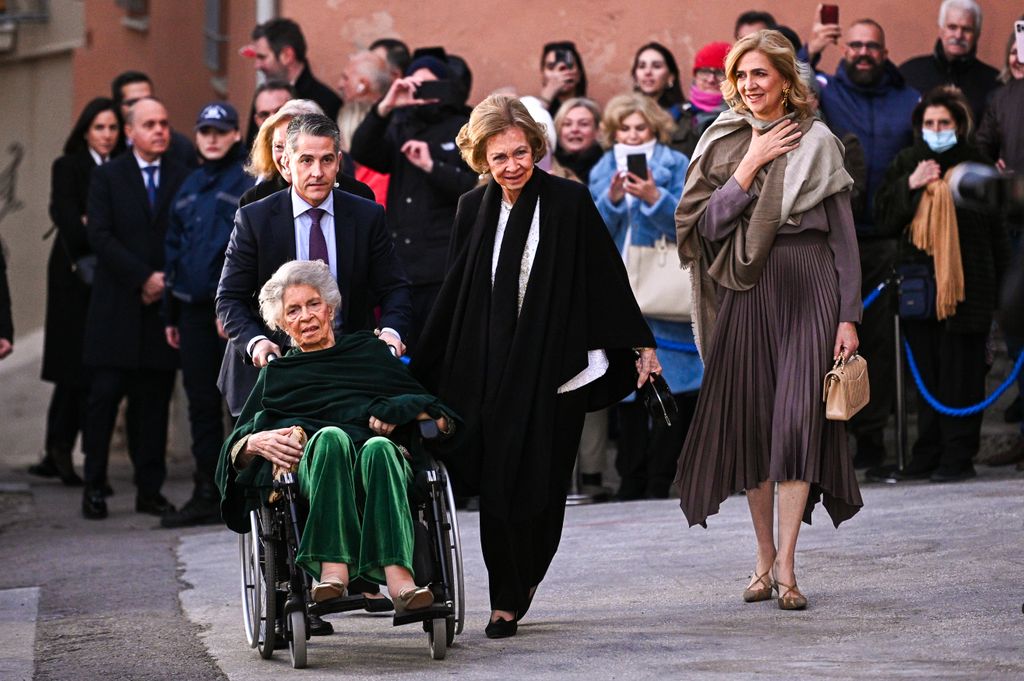 Queen Sofia with Princess Irene and Infanta Cristina at the wedding of Prince Nikolaos of Greece and Chrysi Vardinoyannis