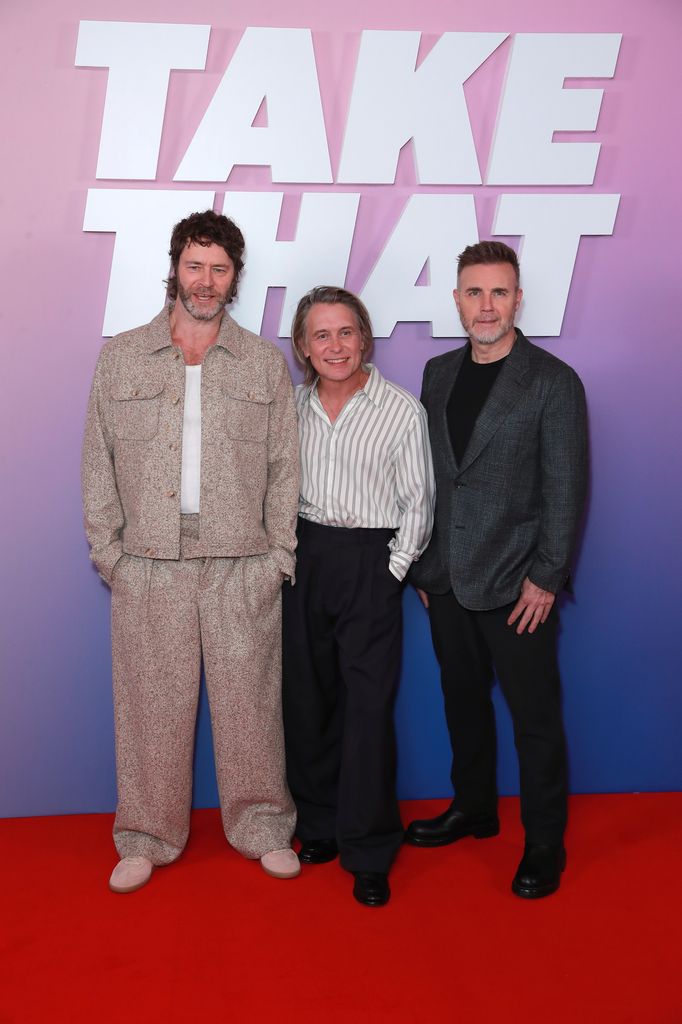 Take That's remaining three members gave a surprise performance to excited fans at the screening