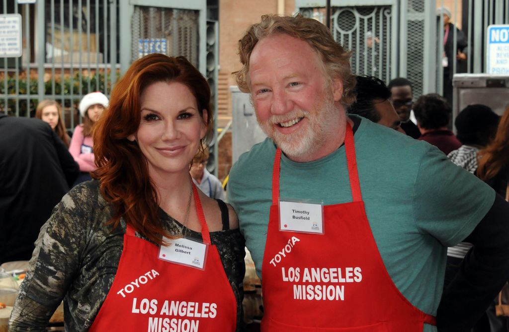 Melissa Gilbert and actor Timothy Busfield participate in the Los Angeles Mission Christmas Eve lunch For The Homeless held at the Los Angeles Mission on December 24, 2012