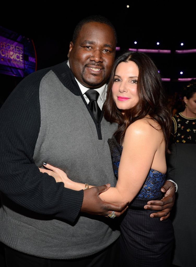 Quinton with Sandra Bullock before his dramatic weight loss