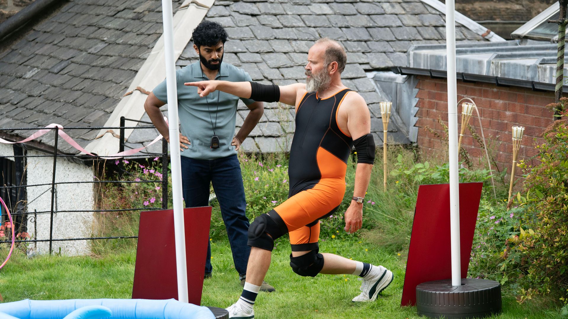 Danny Ashok and Greg Hemphill in a still image from Dinosaur