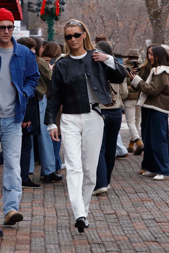 Bella Hadid is seen out and about  in Aspen in white jeans and black leather jacket