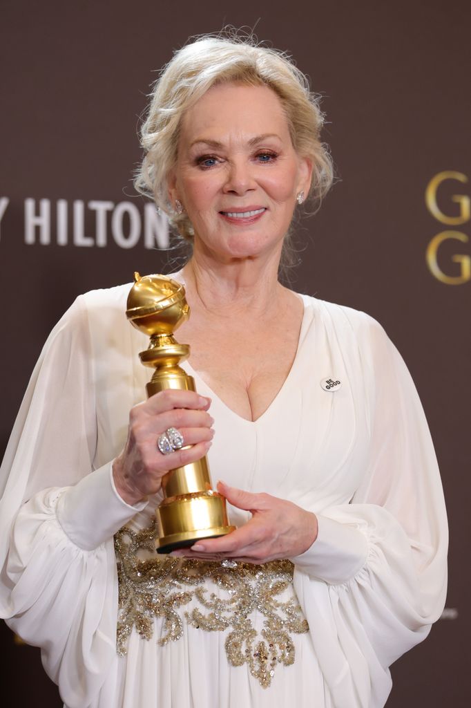 Jean wore a "Be Good" pin on her gown