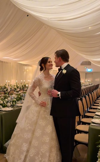 A photo of Holly and Adam on their wedding day