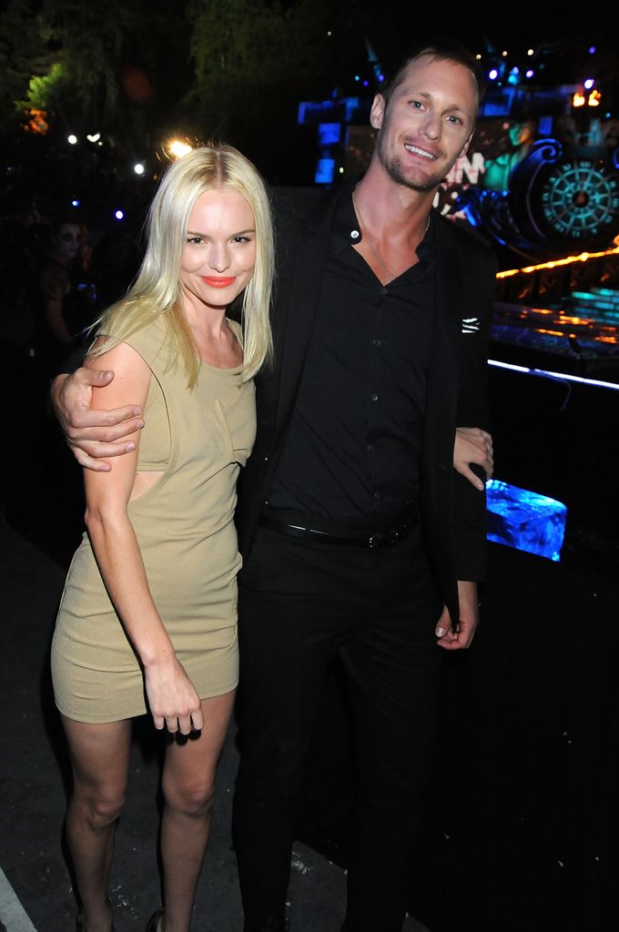 Kate Bosworth in green dress and Alexander Skarsgard in black shirt  onstage during Spike TV's Scream 2009 