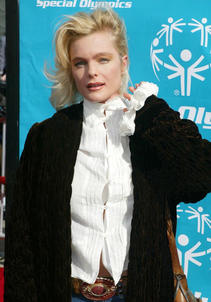 Erika with blonde hair looking glam